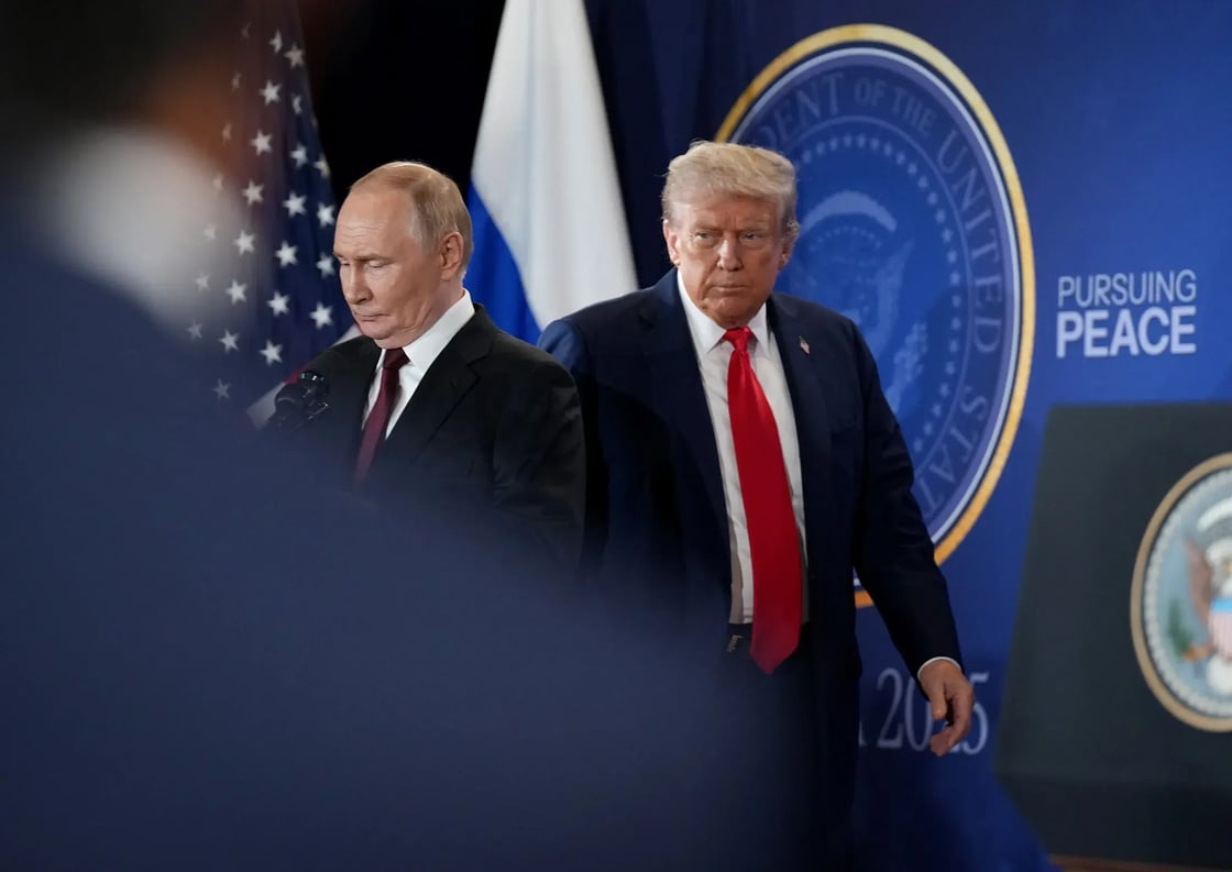 U.S. President Donald Trump and Russian President Vladimir Putin arrive for a press conference at Joint Base Elmendorf-Richardson on August 15, 2025, in Anchorage, Alaska. 