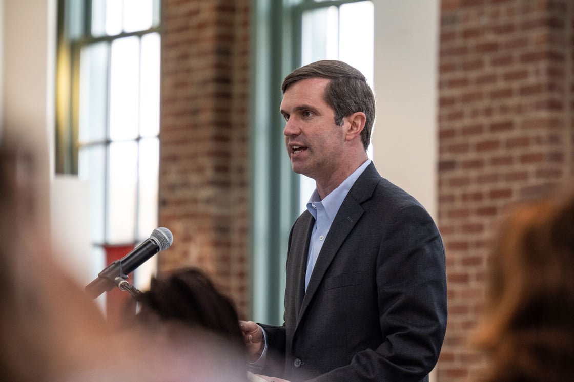 Kentucky Gov. Andy Beshear speaks at the Center for African American Heritage during a bill signing event on April 9, 2021, in Louisville, Kentucky. (Getty/Jon Cherry)