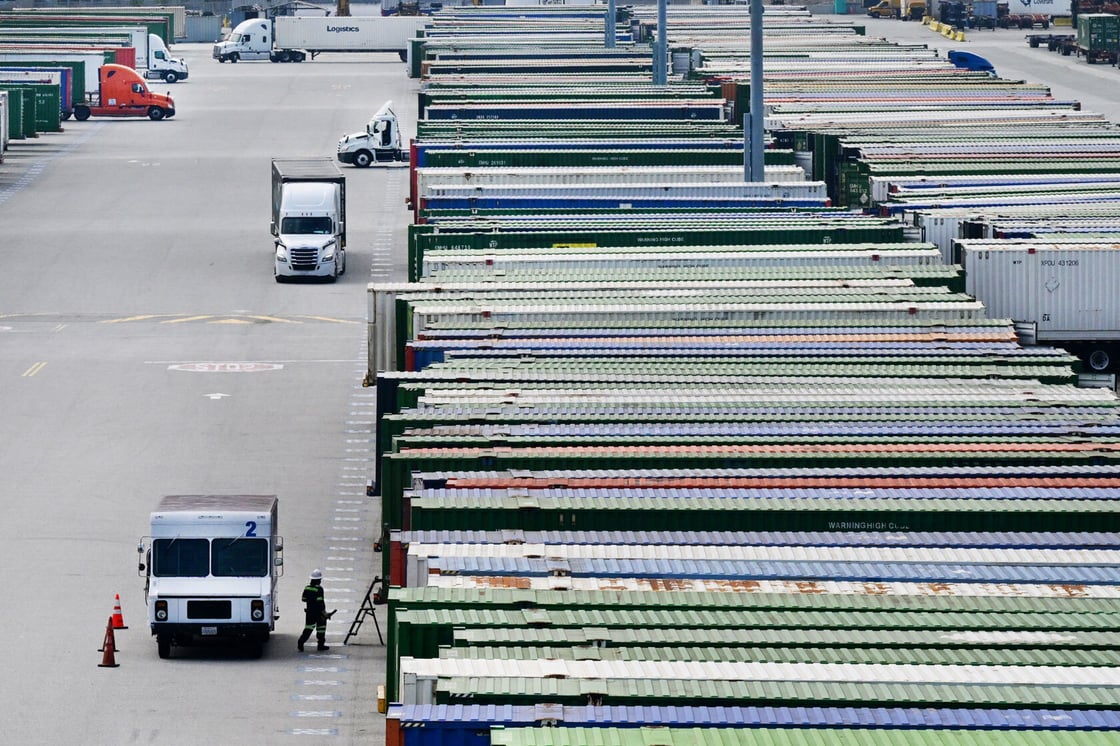 Container trucks sit idle at the LATC-Union Pacific Los Angeles Transport Center rail yard in Los Angeles on February 24, 2026. (Getty/J. Brown)