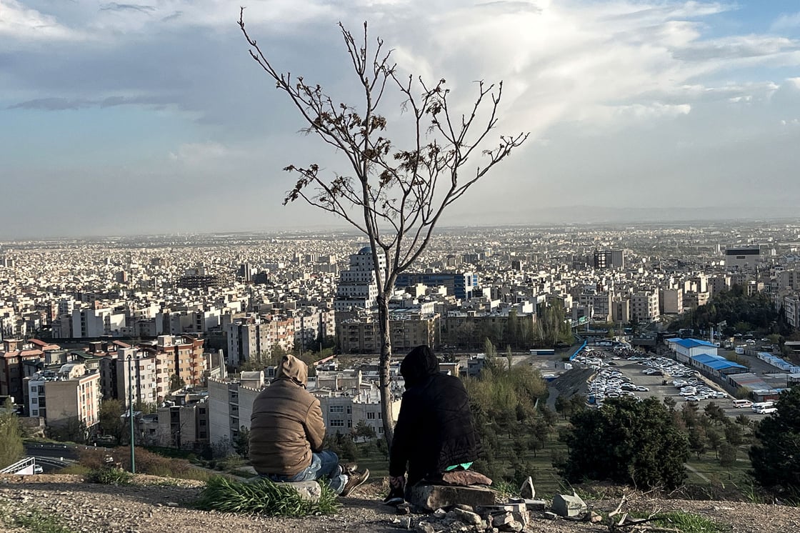 People overlook the city of Tehran, Iran, on April 14, 2026. (Getty/AFP)
