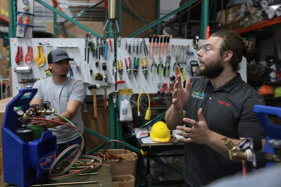 An instructor teaches students about brazing in HVAC systems at a trade school in Homestead, Florida, on May 9, 2026. (Getty/Joe Raedle)